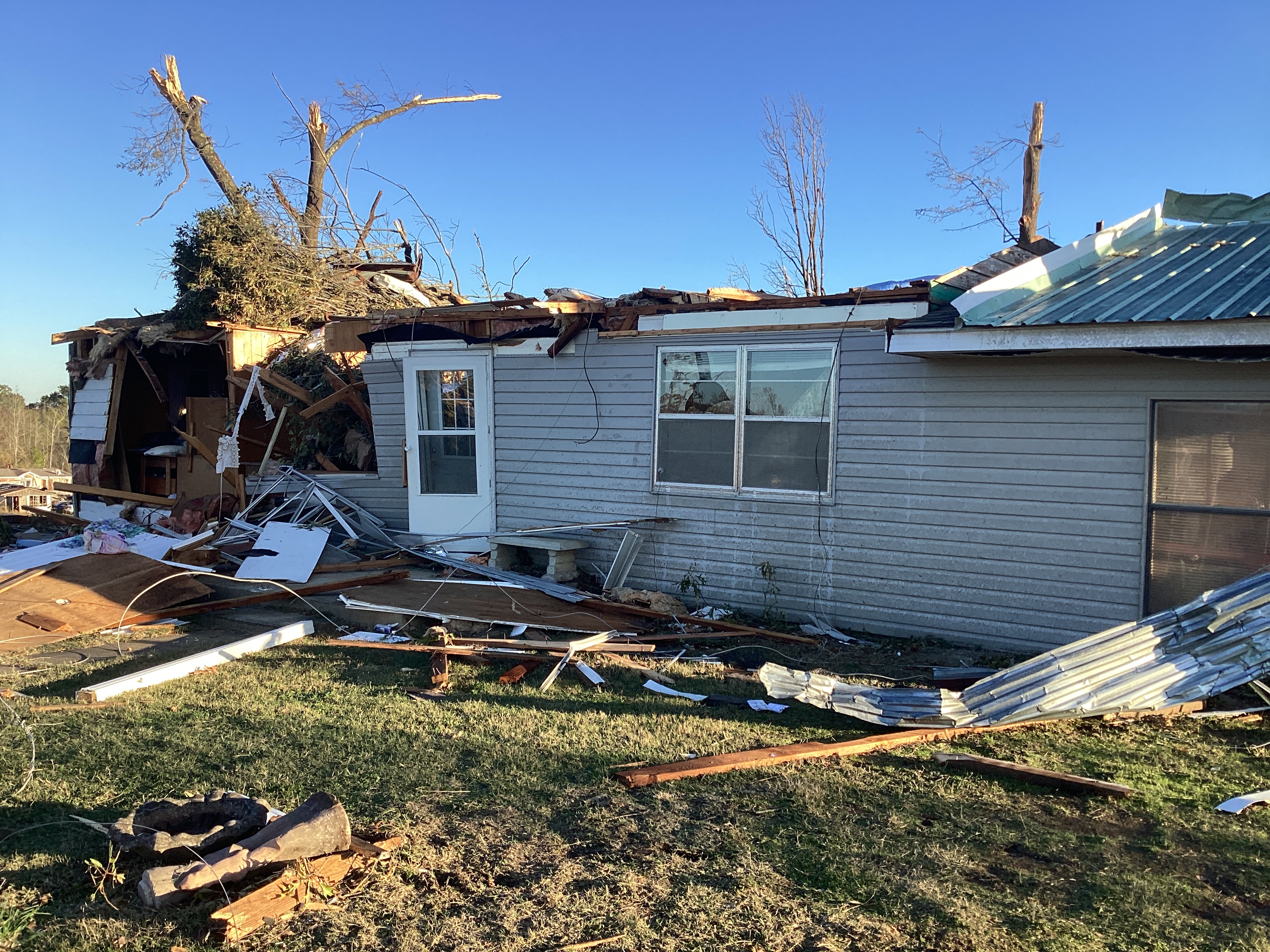 Low-end EF2 damage to a home east of Pickens, Oklahoma.