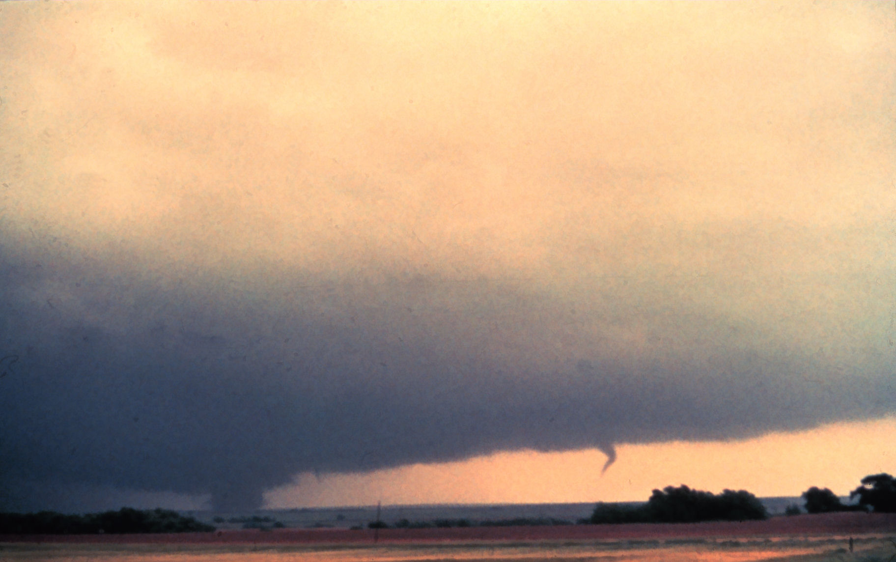 Two tornadoes on the ground southwest of Cheyenne, Oklahoma on May 16, 1977.