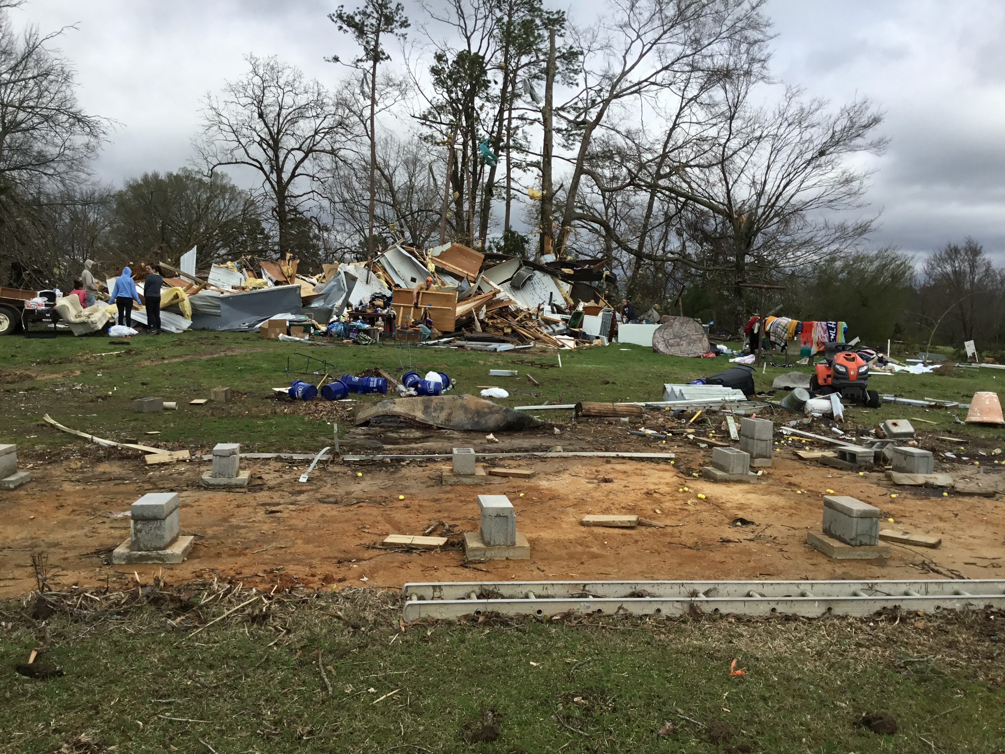 A mobile home that was obliterated by a high-end EF2 tornado near Kirby, Arkansas. Two minor injuries occurred at this location