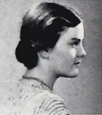 Photograph of the right profile of a woman's head and shoulders