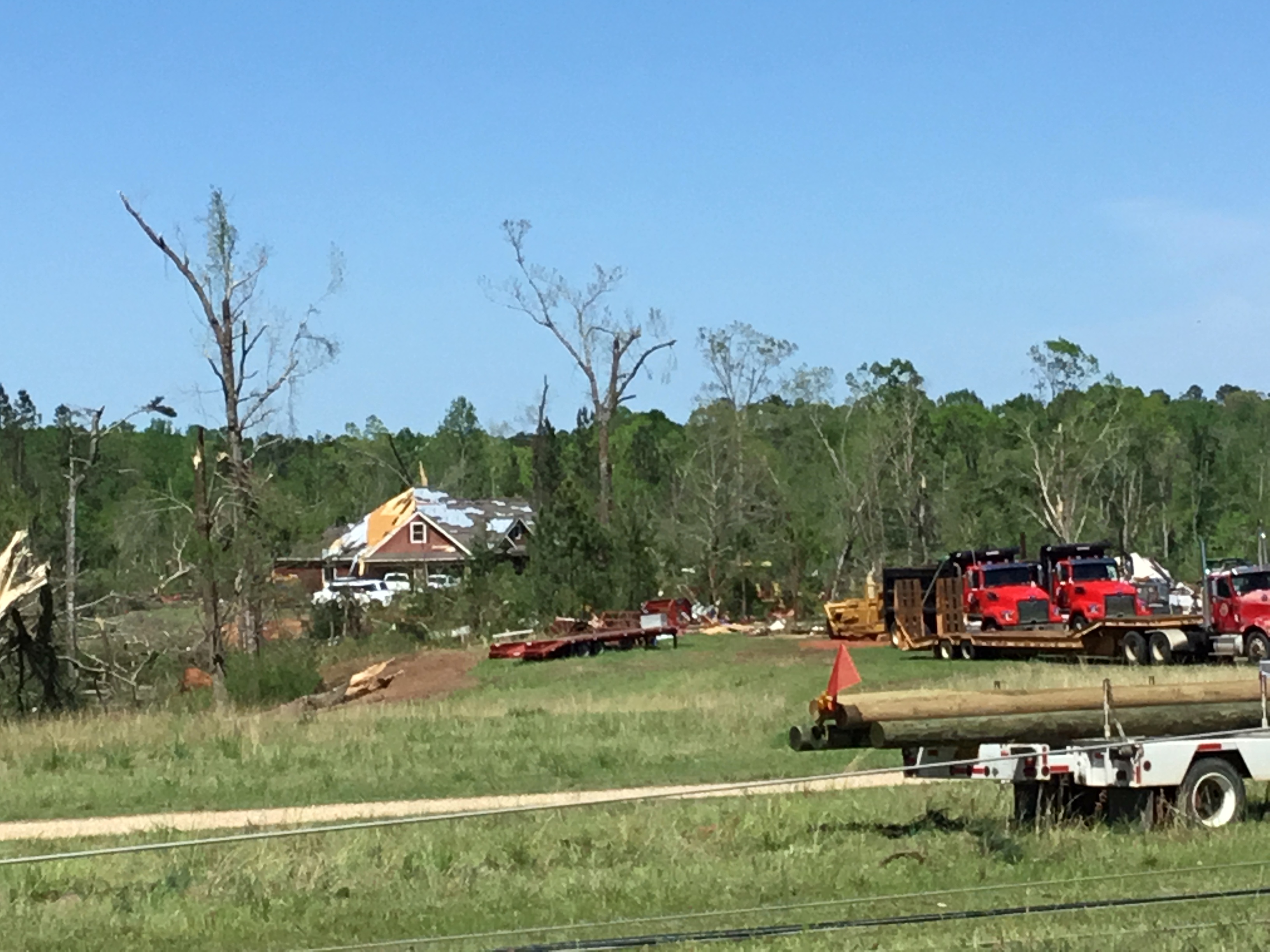 EF2 damage to trees and a home in Clarkdale, Mississippi.