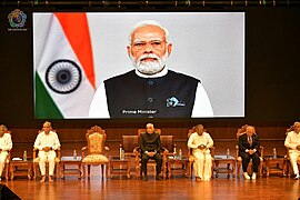 Prime Minister of India - Narendra Modi addressing the gathering at the inauguration of Sai Hira Global Convention Centre