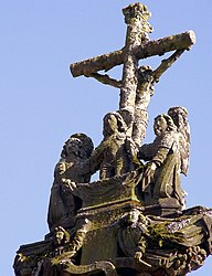 The resurrection. This can be seen on the central cross of the calvary and on the reverse side of the depiction of the crucified Christ, Christ is shown emerging from his tomb