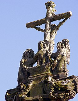 The resurrection. This can be seen on the central cross of the calvary and on the reverse side of the depiction of the crucified Christ. The risen Christ emerges from his tomb.