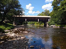 Side view of the covered bridge with the Willowemoc Creek located directly below