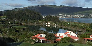 Elsdon and the surrounding area, seen in the back right, viewed from Aotea Lagoon.