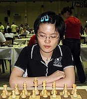 Hou Yifan staring while playing chess