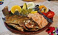 Mojarra frita (fried) served with various garnishes, including nopales, at Isla de Janitzio, Michoacán.