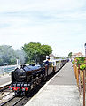 A train pulled by the locomotive Samson about to leave Dymchurch station
