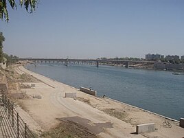 Construction work going on near the river under the Sabarmati River Front Development Project
