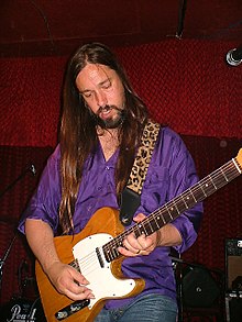 Rob Baker performing with Stripper's Union, 2006
