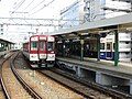 A westbound Kintetsu train on track 3