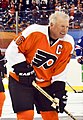 Bob Clarke, shown here during the warmup for the 2012 Winter Classic Alumni Game, served 19 seasons over two stints as general manager.