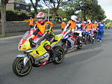 Competitors line-up to start the newcomers' speed controlled lap TT Grandstand 18 August 2012