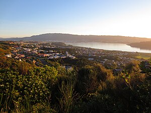 A view from the north-east: Porirua Harbour to the right, Porirua city centre and Rangituhi/Colonial Knob ridge in the background