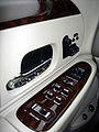Chromed interior door panel of a 1998 Lincoln Town Car