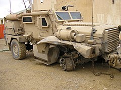Cougar hit by a mine explosion, all crew survived, the vehicle was driven back to base on three wheels