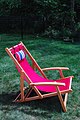 Deckchair with arms and padded head rest