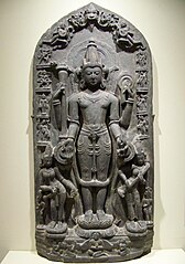 11th-century Vishnu sculpture the goddesses Lakshmi and Sarasvati. The edges show reliefs of Vishnu avatars Varaha, Narasimha, Balarama, Rama, and others. Also shown is Brahma. (Brooklyn Museum)[187]