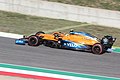 Lando Norris driving the McLaren MCL35 at the 2020 Tuscan Grand Prix. The rainbow graphic, added in support of Formula One's #WeRaceAsOne campaign, is visible on the sidepods.