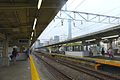 Platforms, with Tokyo Skytree in the distance, 2015