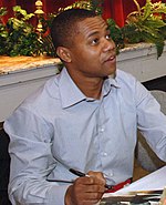 Photo of Cuba Gooding, Jr. signing autographs in 2006.