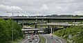 Image 32The multi-level junction between the M23 and M25 motorways near Merstham in Surrey. The M23 passes over the M25 with bridges carrying interchange slip roads for the two motorways in between.