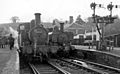 Monmouth Troy in November 1958. On the left is 0-4-2T No. 1455 pushing an auto-train from Ross-on-Wye. On the right is 0-6-0PT No. 6439 on a train to Severn Tunnel Junction