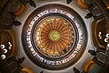 Image 5The dome of the Illinois State Capitol. Designed by architects Cochrane and Garnsey, the dome's interior features a plaster frieze painted to resemble bronze and illustrating scenes from Illinois history. Stained glass windows, including a stained glass replica of the State Seal, appear in the oculus. Ground was first broken for the new capitol on March 11, 1869, and it was completed twenty years later. Photo credit: Daniel Schwen (from Portal:Illinois/Selected picture)