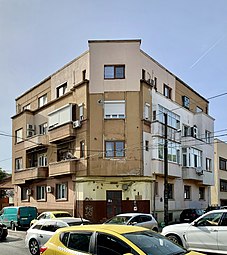 Mutilations - Calea Călărașilor no. 75, Bucharest, a small interwar Art Deco apartment building, where each owner painted the exterior of their apartment how they wanted, thermally insulated or not, thus destroying its facade