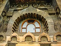 Exterior of chaitya hall, Cave 9, Ajanta Caves, 1st century BCE. The chaitya arch window frame is repeated several times as a decorative motif.
