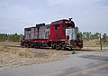 Locomotive #517 runs past the site of the new yard at Suffolk, Virginia after switching the BASF plant. Today it sits behind a warehouse in the Wilroy industrial park, out of service and awaiting a scrapper to cut it up.