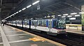 A four-car MRTC 3000 class train at Araneta Center-Cubao station in April 2022
