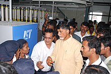 Chandrababu naidu with factory workers in textile industry