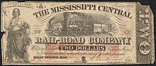 Two dollar note. Illustrated with a woman on the left and a train in the middle. Inscribed text reads "RECEIVABLE in payment of all dues to the Co. January 1st, 1862. THE MISSISSIPPI CENTRAL RAIL-ROAD COMPANY Will pay to bearer TWO DOLLARS in current, Bank or Confederate State notes, when the sum of Five dol is presented. HOLLY SPRINGS, MISS."