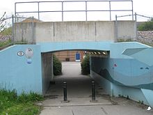 Short pedestrian underpass beneath a railway line
