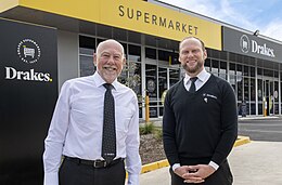 Roger Drake (left) with son John-Paul Drake (right) standing in front of their Wayville, South Australia store