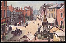 A postcard showing a streetscene of George Street, Luton looking North West towards the town hall in the early 20th Century.
