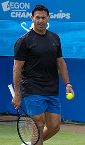 Roger Rasheed coaching Grigor Dimitrov during practice at the Queens Club Aegon Championships in London, England.