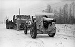 A gun in German service towed by a half-track in Northern Russia during the Winter of 1943.