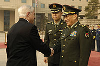 U.S. Defense Secretary Robert Gates greets Chinese Defense Minister Cao Gangchuan in Beijing, China on 5 November 2007