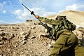 Israeli paratrooper prepares to launch Simon rifle grenade from M4 Carbine