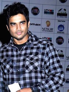 A photo of R. Madhavan posing for the camera.