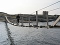 A simple suspension footbridge in Finland