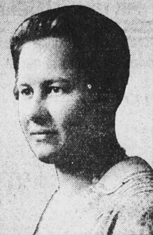 Addie Viola Smith, in two-thirds profile. A white woman with dark hair and wearing a light-colored blouse.
