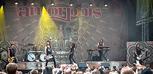 Amorphis performing in 2018