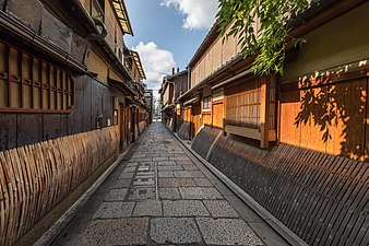 Dwellings with sudare in the street leading to the Gion Tatsumi Bridge