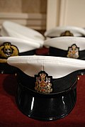 Peaked cap with badge of a senior appointment chief petty officer 1st class of the RCN.
