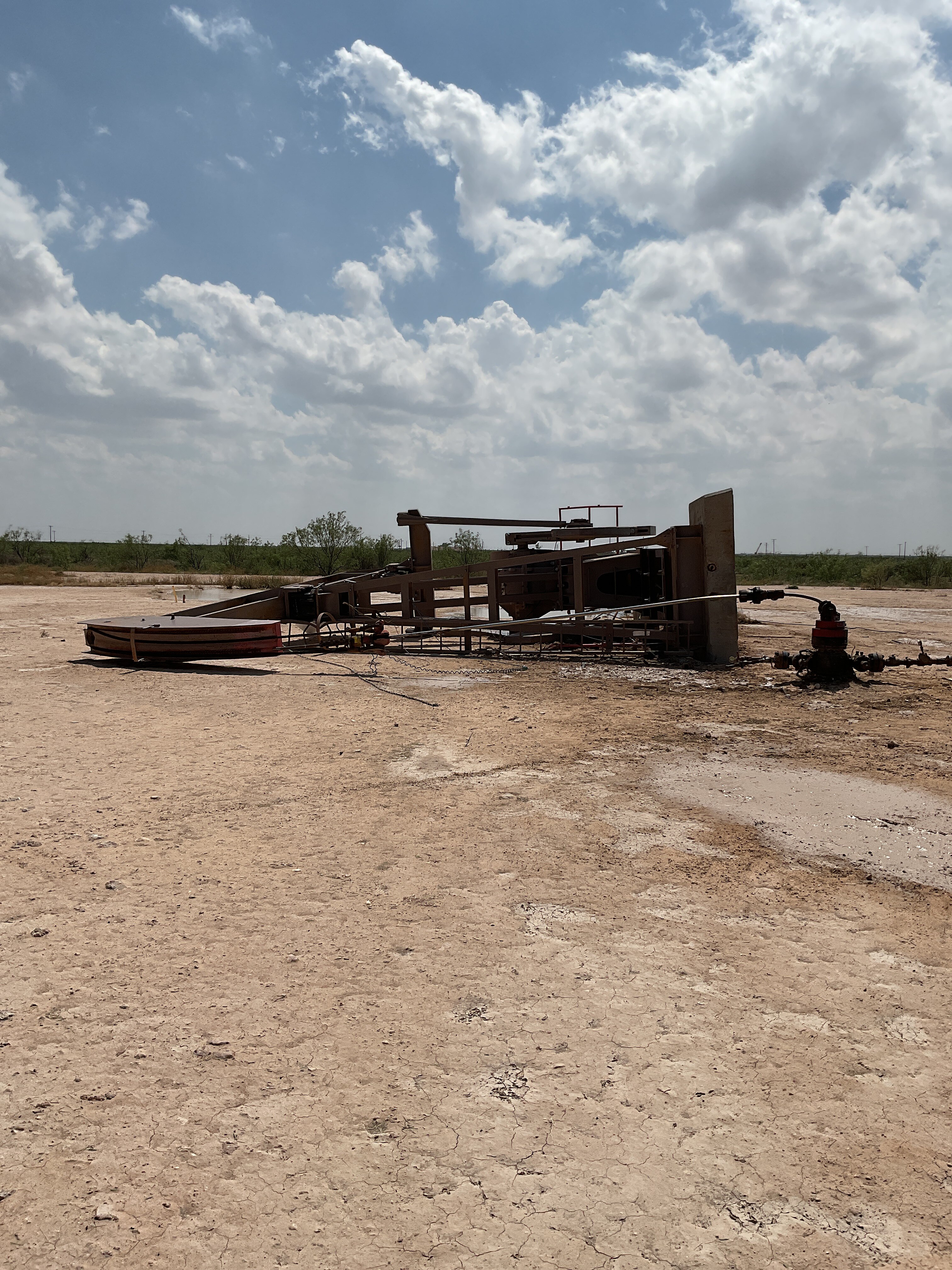 A pump jack that was overturned by an EF3 tornado west of Midkiff, Texas.