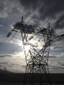 A five-hundred kilovolt (500 kV) three-phase transmission tower in Washington State, the line is bundled 3-ways